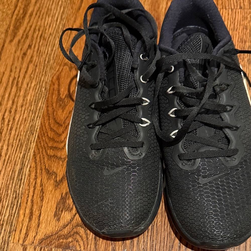 Black Nike Athletic Sneakers with Silver Accents